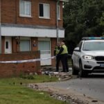 Emergency services respond at the Bede House Care Home in Sunderland, England, where a BMW crashed into the building after a police chase, causing significant damage and loss of life in July 2025.